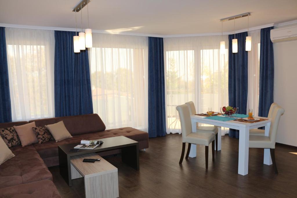 Posezení v ubytování Vello Apartments