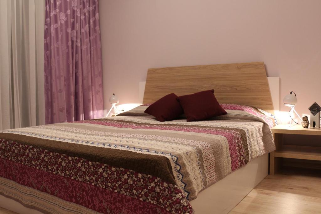 Postel nebo postele na pokoji v ubytování Vello Apartments
