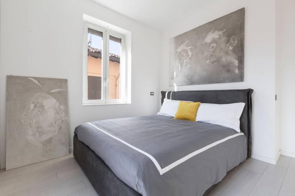 Posteľ alebo postele v izbe v ubytovaní Unique 4 Storey House on Naviglio 4Bd, 4Bt