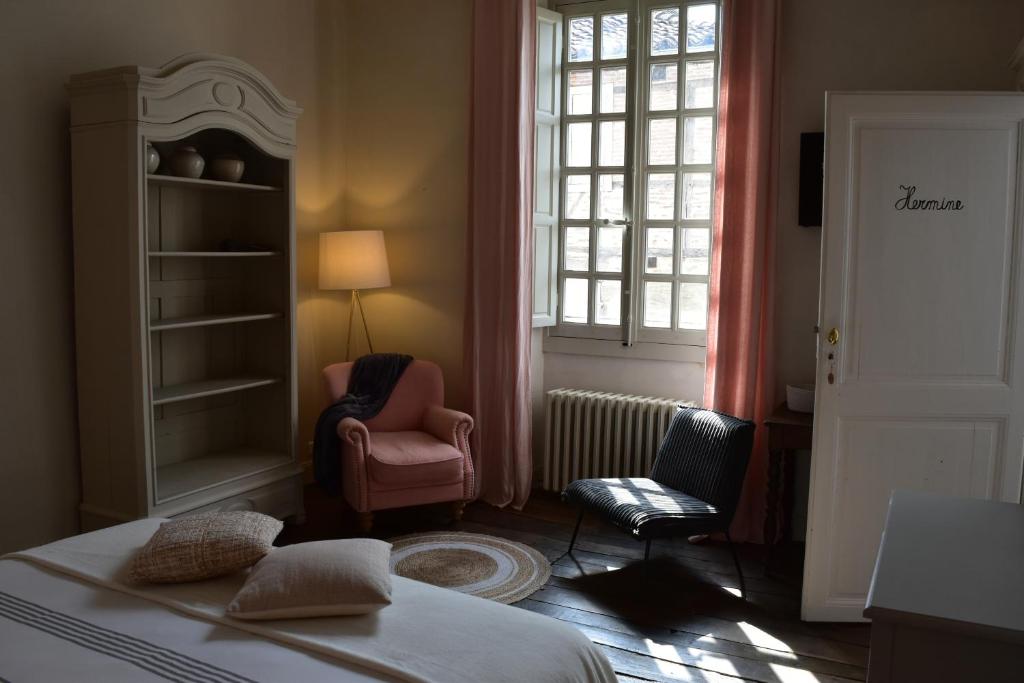 Postel nebo postele na pokoji v ubytování Chambre d'hôtes Conquans