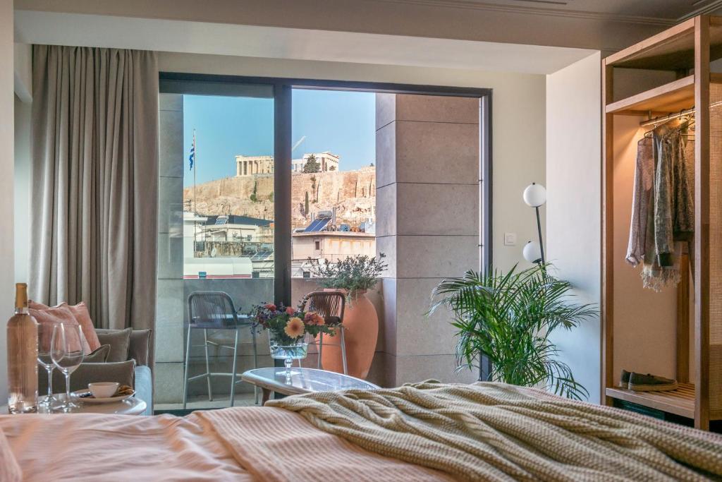 Postel nebo postele na pokoji v ubytování Niche Hotel Athens