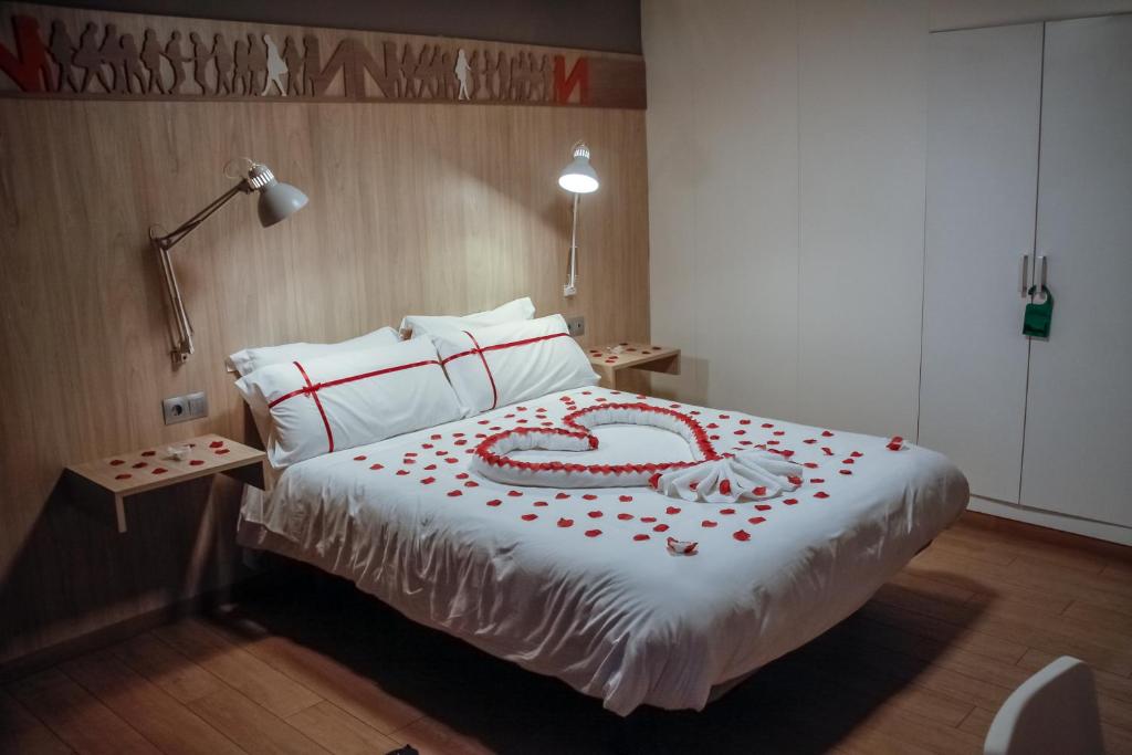 Voodi või voodid majutusasutuse Hotel Nomada toas