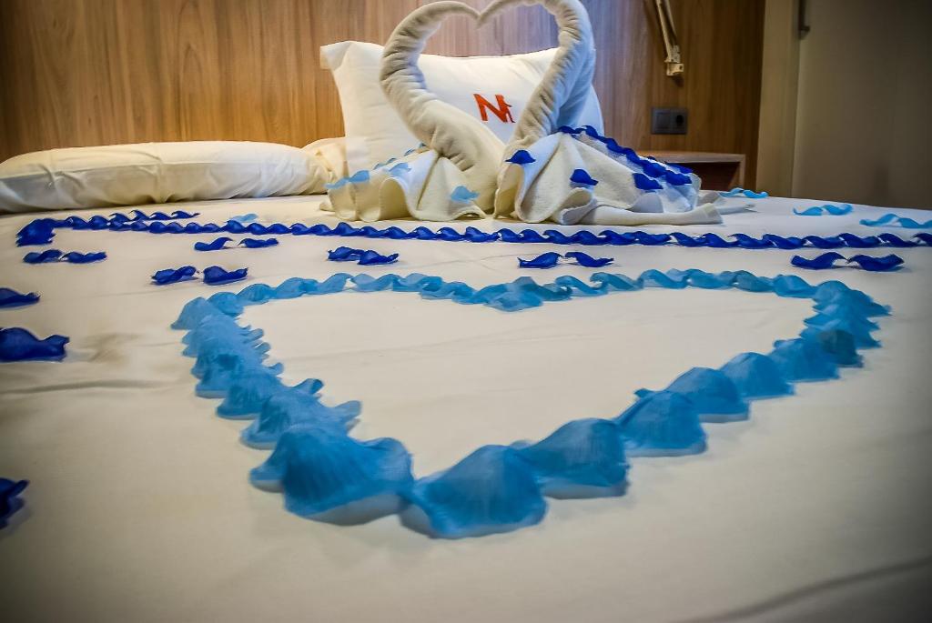 Voodi või voodid majutusasutuse Hotel Nomada toas