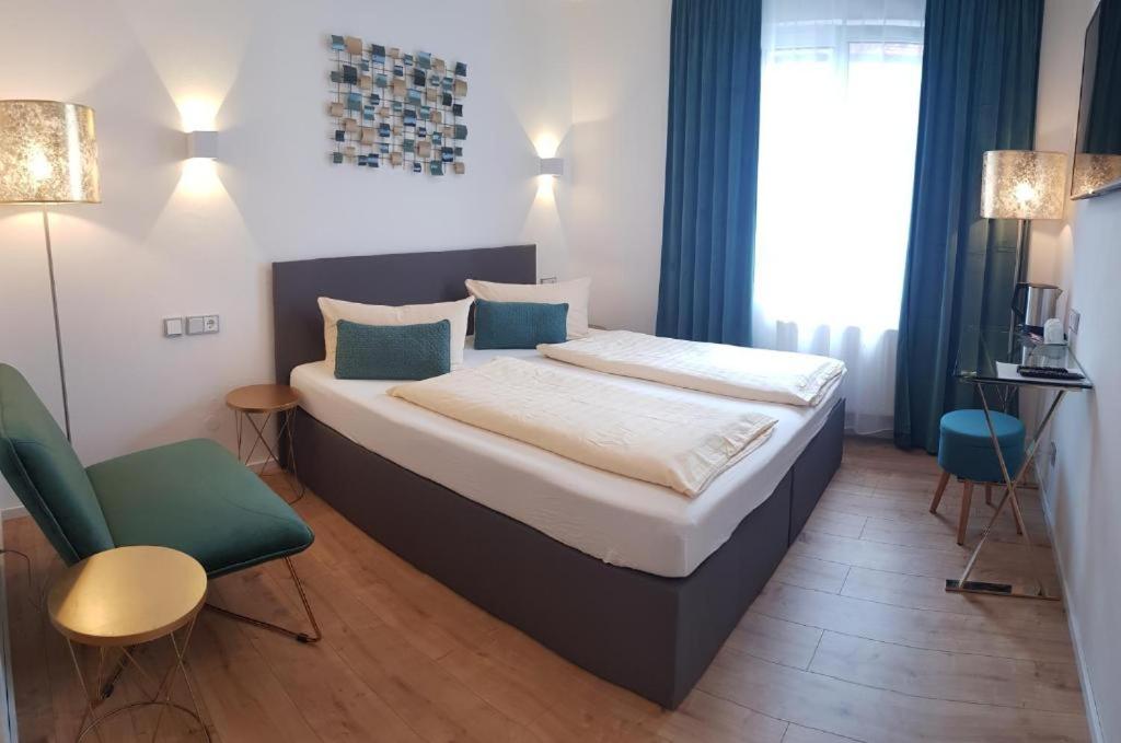 Postel nebo postele na pokoji v ubytování Füssen Apartments - Center Apartments