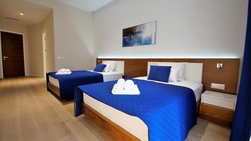 Postel nebo postele na pokoji v ubytování Condo Studio Plaza