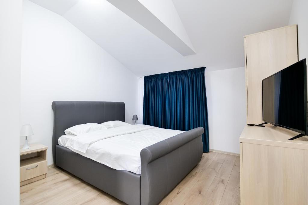 TV a/nebo společenská místnost v ubytování Hotel Ema&Zain