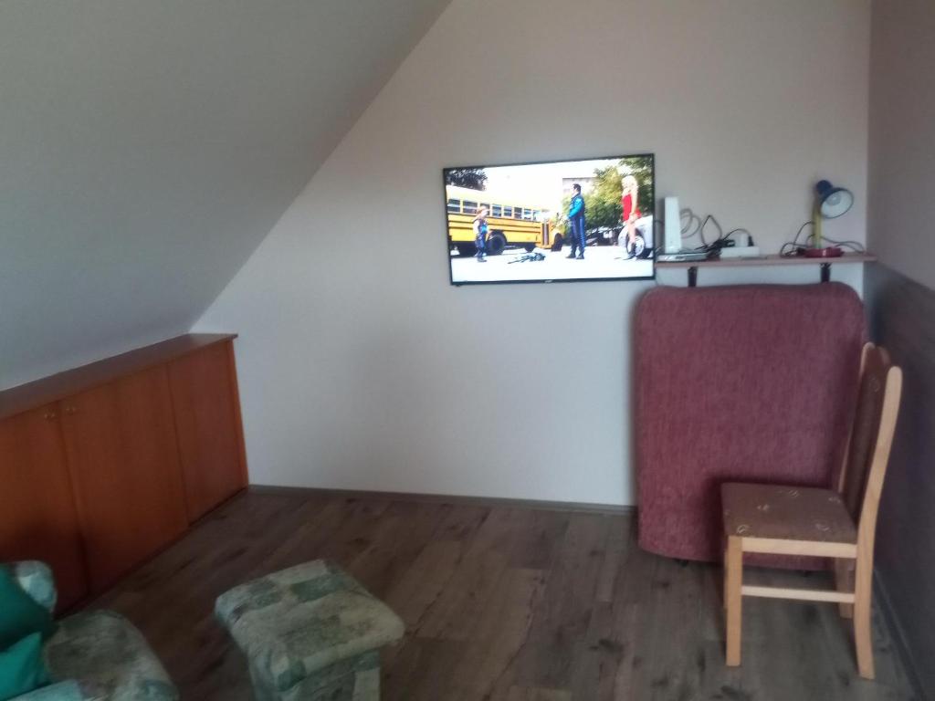 TV a/nebo společenská místnost v ubytování Budai Vám Apartmanház