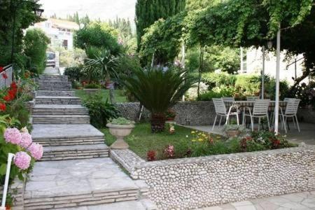 Vonkajšia záhrada v ubytovaní Guesthouse Kanjuo