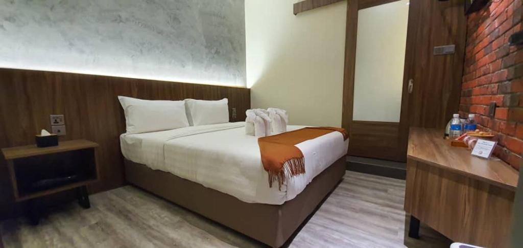 Postel nebo postele na pokoji v ubytování VISTA HOTEL