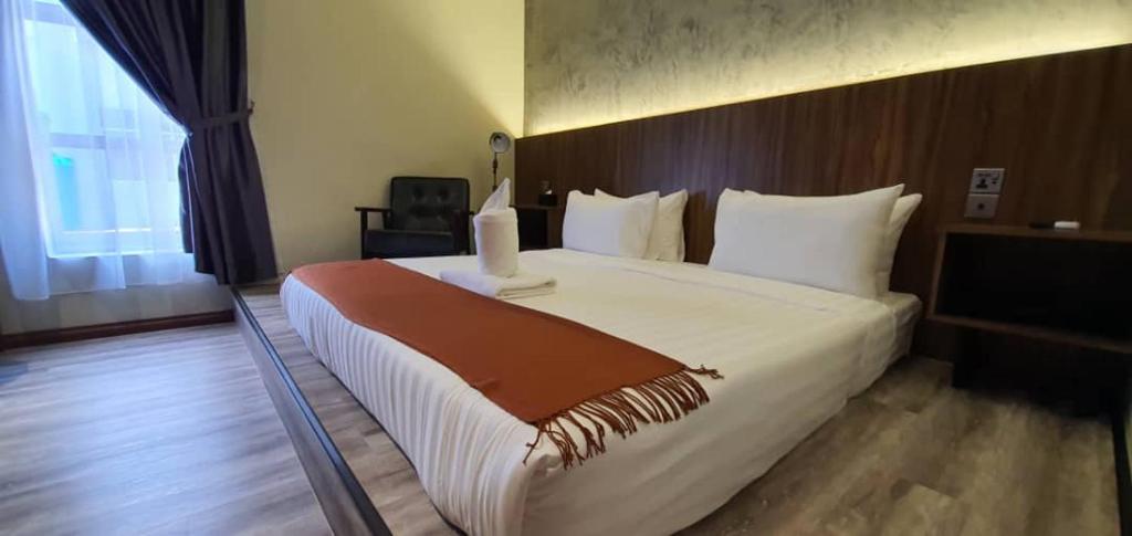 Postel nebo postele na pokoji v ubytování VISTA HOTEL