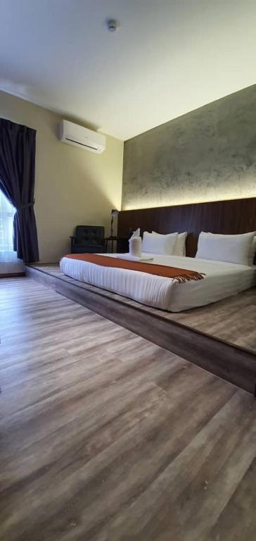 Postel nebo postele na pokoji v ubytování VISTA HOTEL