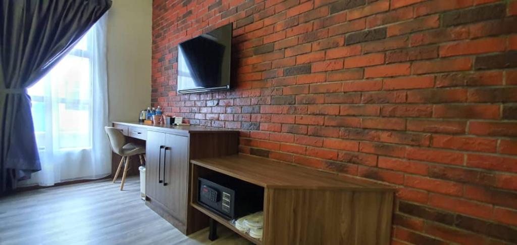 Kuchyň nebo kuchyňský kout v ubytování VISTA HOTEL