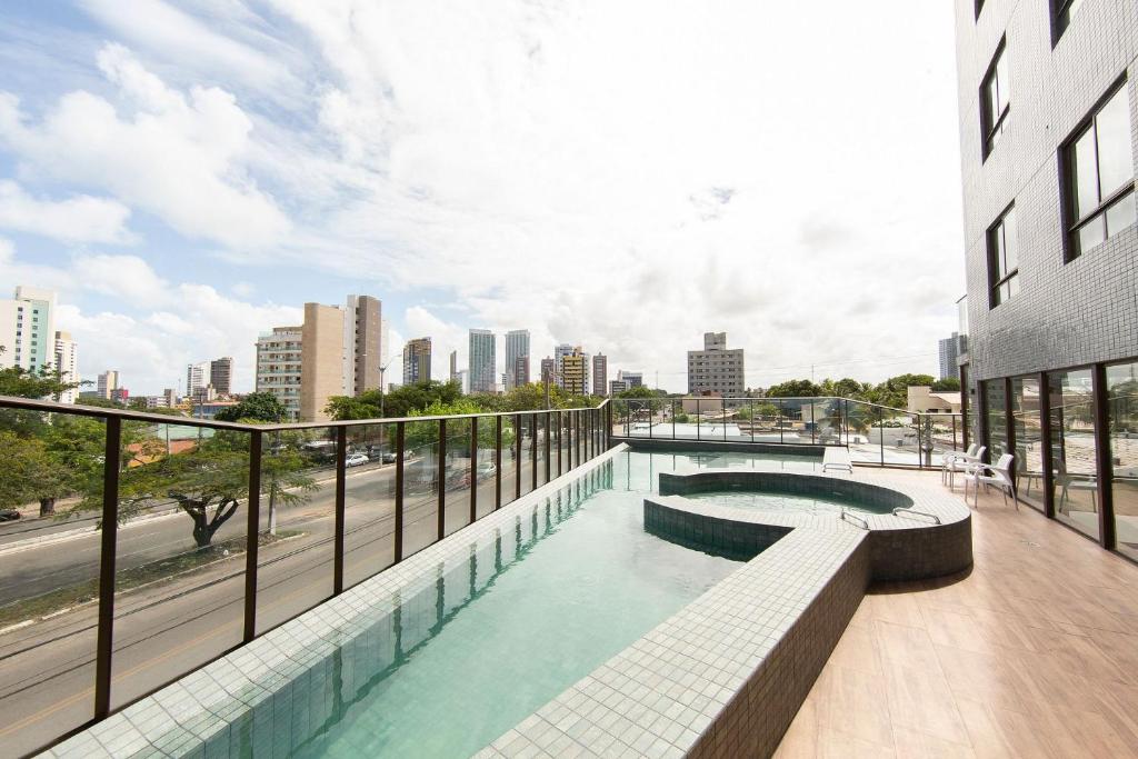  Flat novo próximo à orla no Ilusion Hotel por Carpediem