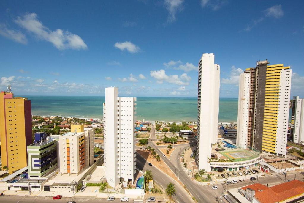  Flat novo próximo à orla no Ilusion Hotel por Carpediem