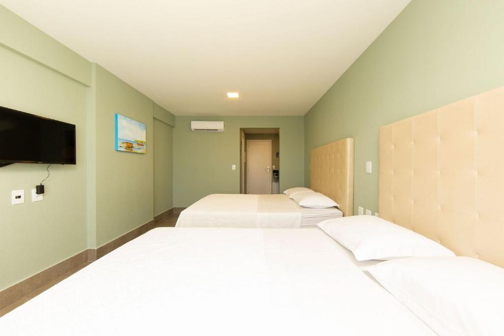  Flat novo próximo à orla no Ilusion Hotel por Carpediem