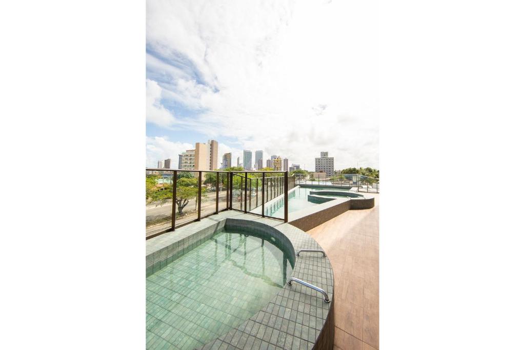  Flat novo próximo à orla no Ilusion Hotel por Carpediem