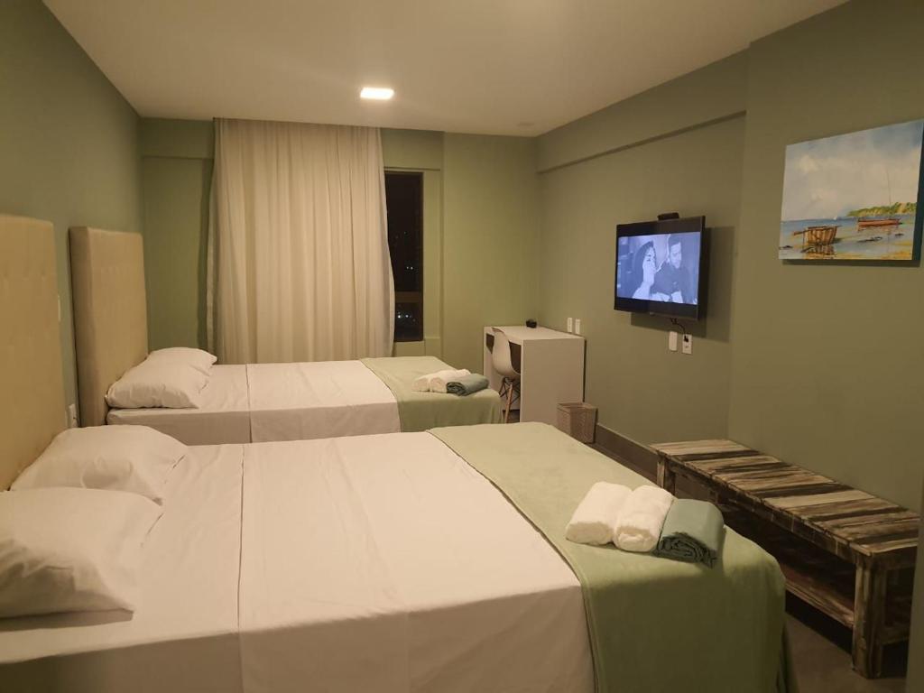  Flat novo próximo à orla no Ilusion Hotel por Carpediem