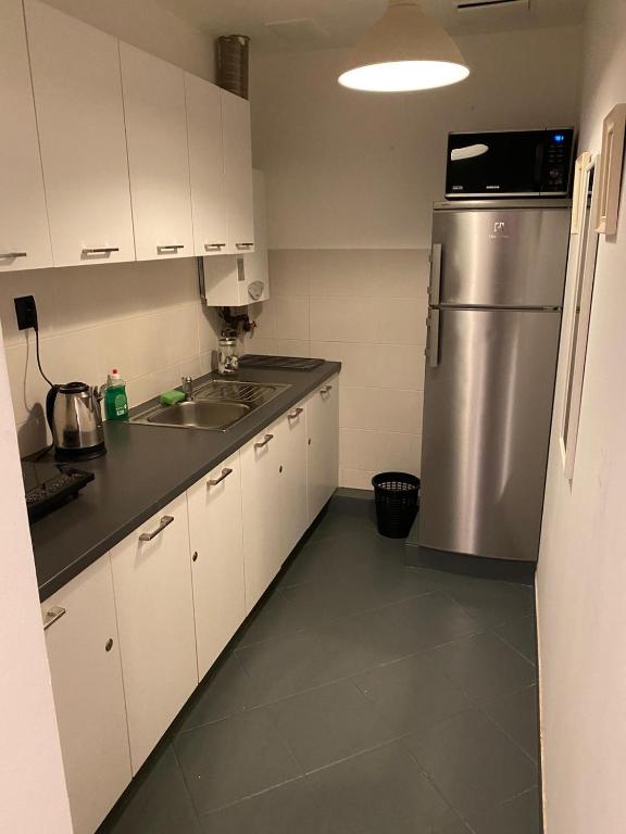 Kuchyňa alebo kuchynka v ubytovaní Main Square 18 King Apartament
