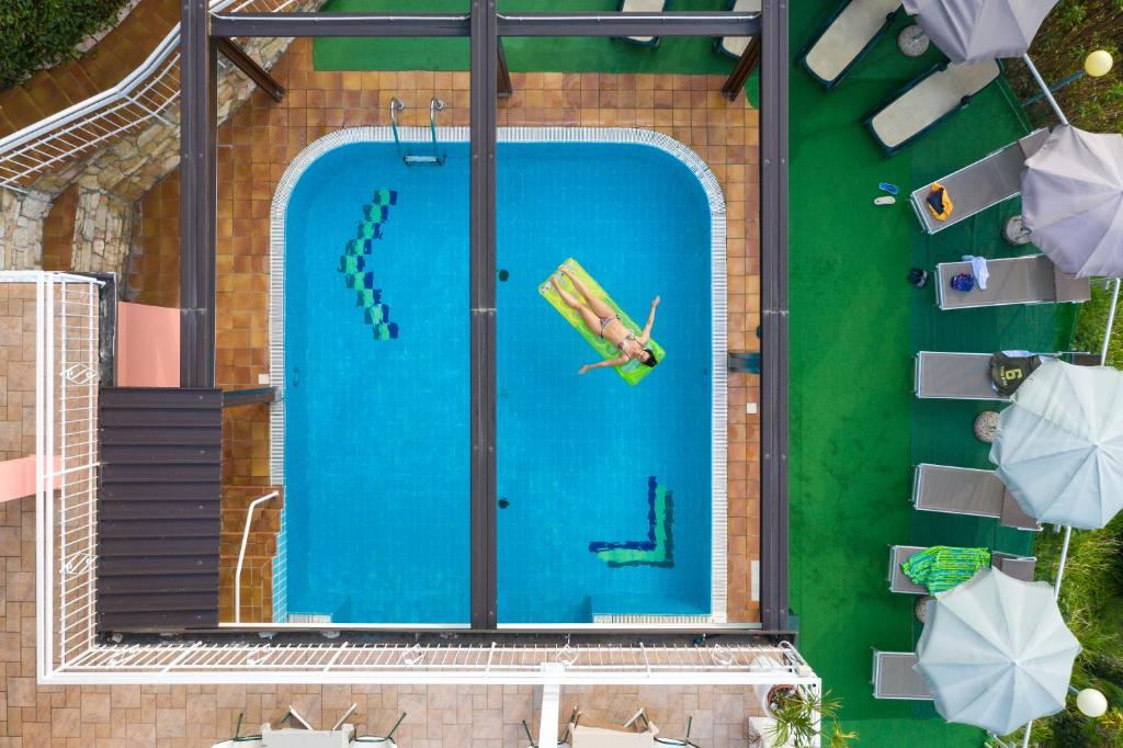 Bazén v ubytování Hotel Eden nebo v jeho okolí