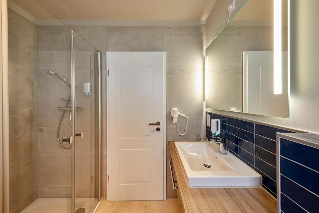 Koupelna v ubytování Hotel Friesenhof