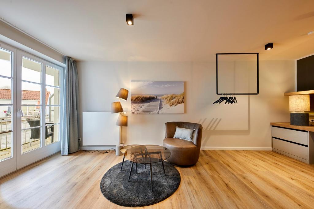 TV a/nebo společenská místnost v ubytování Hotel Friesenhof