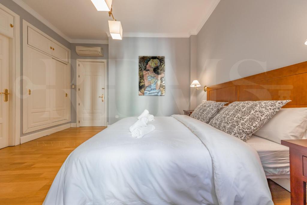 Postel nebo postele na pokoji v ubytování Uncibay Deluxe