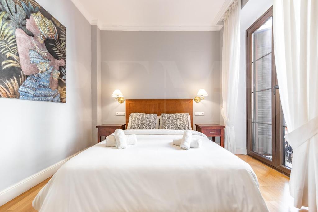 Postel nebo postele na pokoji v ubytování Uncibay Deluxe