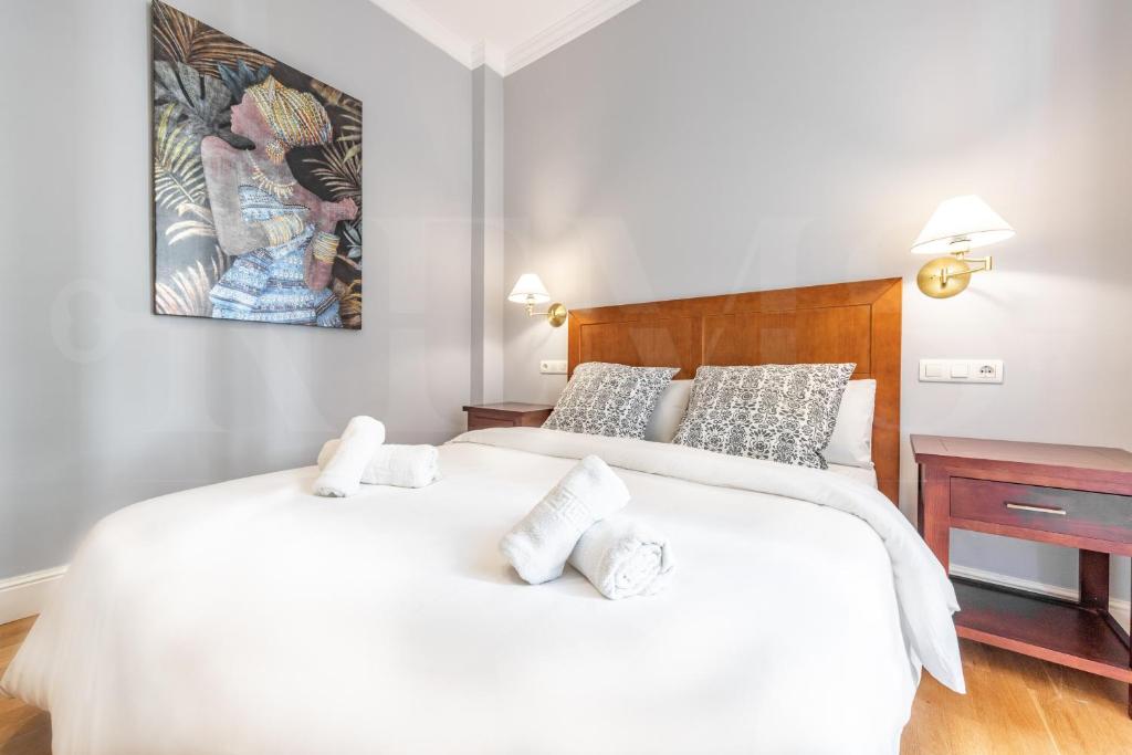 Postel nebo postele na pokoji v ubytování Uncibay Deluxe
