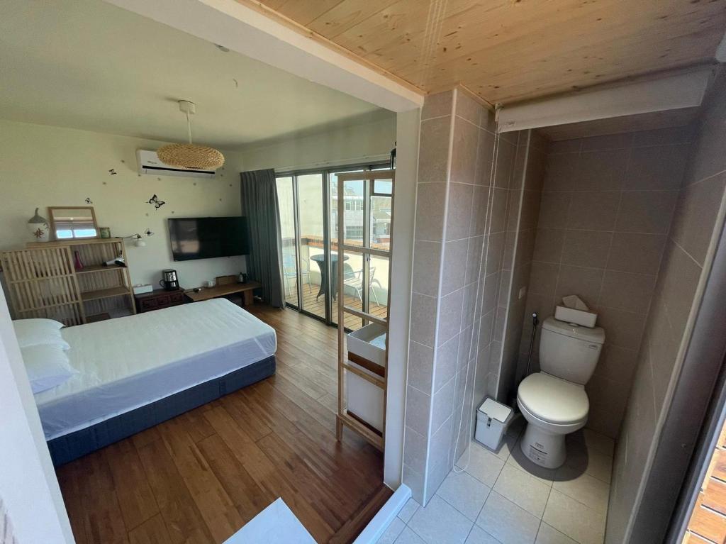 Postel nebo postele na pokoji v ubytování Sigang Vacation Homestay