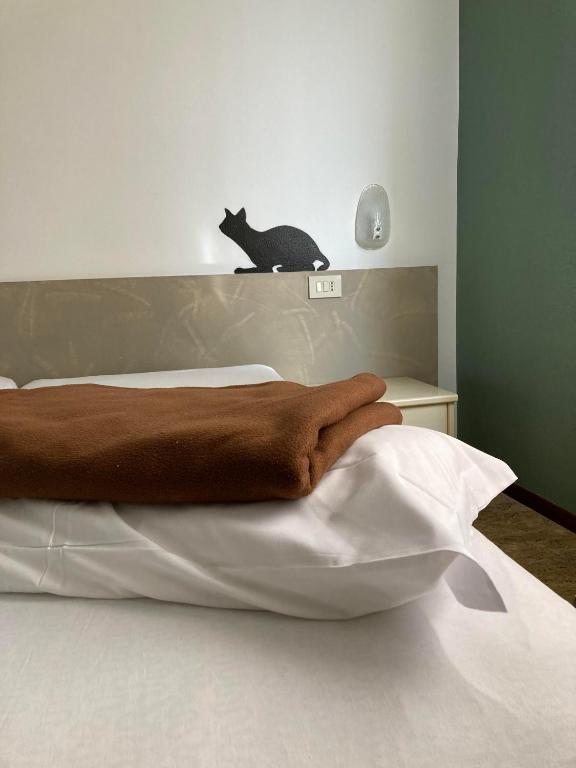 Postel nebo postele na pokoji v ubytování Route77 hostel