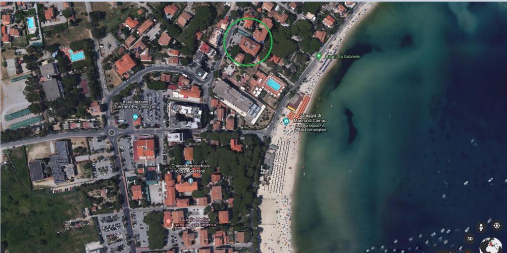 an aerial view of a beach and the ocean at Casa Malu in Marina di Campo