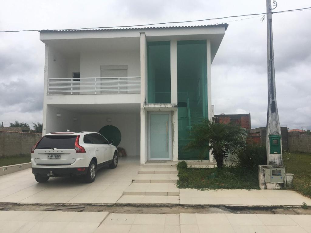  Casa Itanhaém em condomínio fechado de frente para o mar