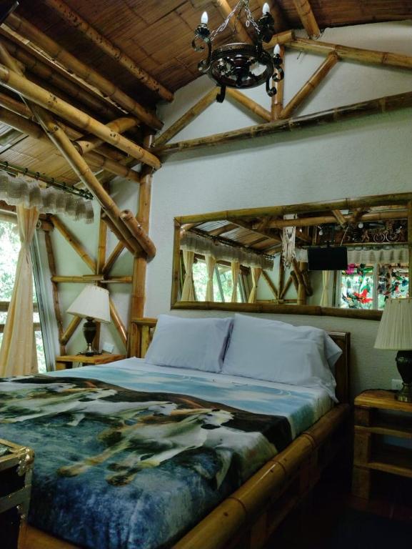 Postel nebo postele na pokoji v ubytování Hospedaje Rural Tupinamba
