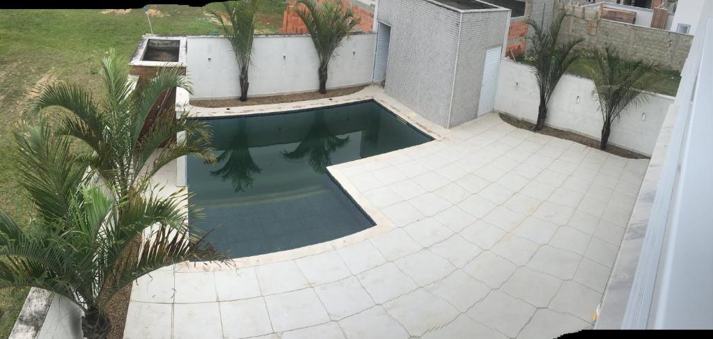  Casa Itanhaém em condomínio fechado de frente para o mar