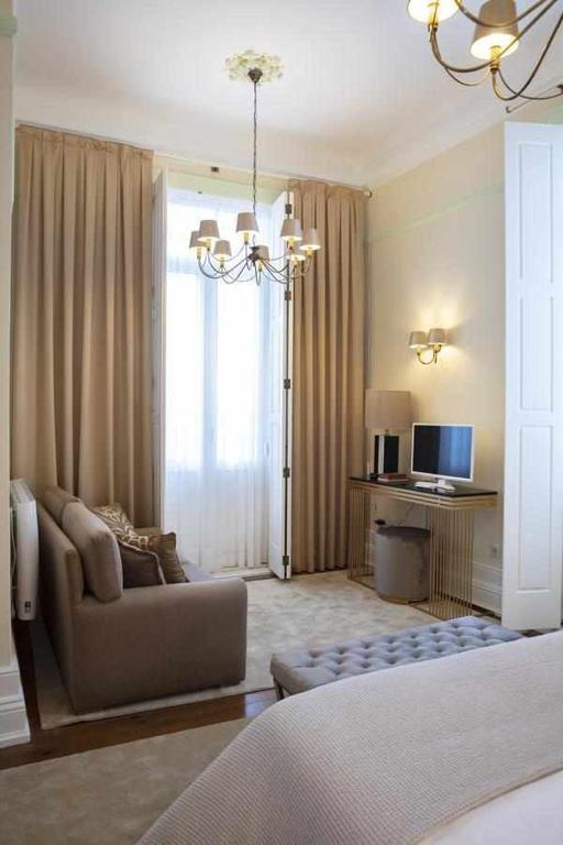 TV a/nebo společenská místnost v ubytování Casa da Granja Boutique