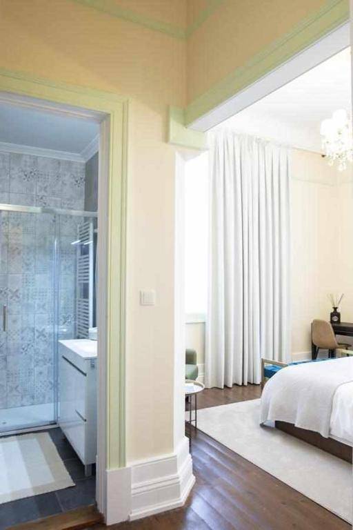 Postel nebo postele na pokoji v ubytování Casa da Granja Boutique