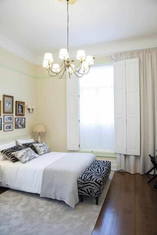 Postel nebo postele na pokoji v ubytování Casa da Granja Boutique