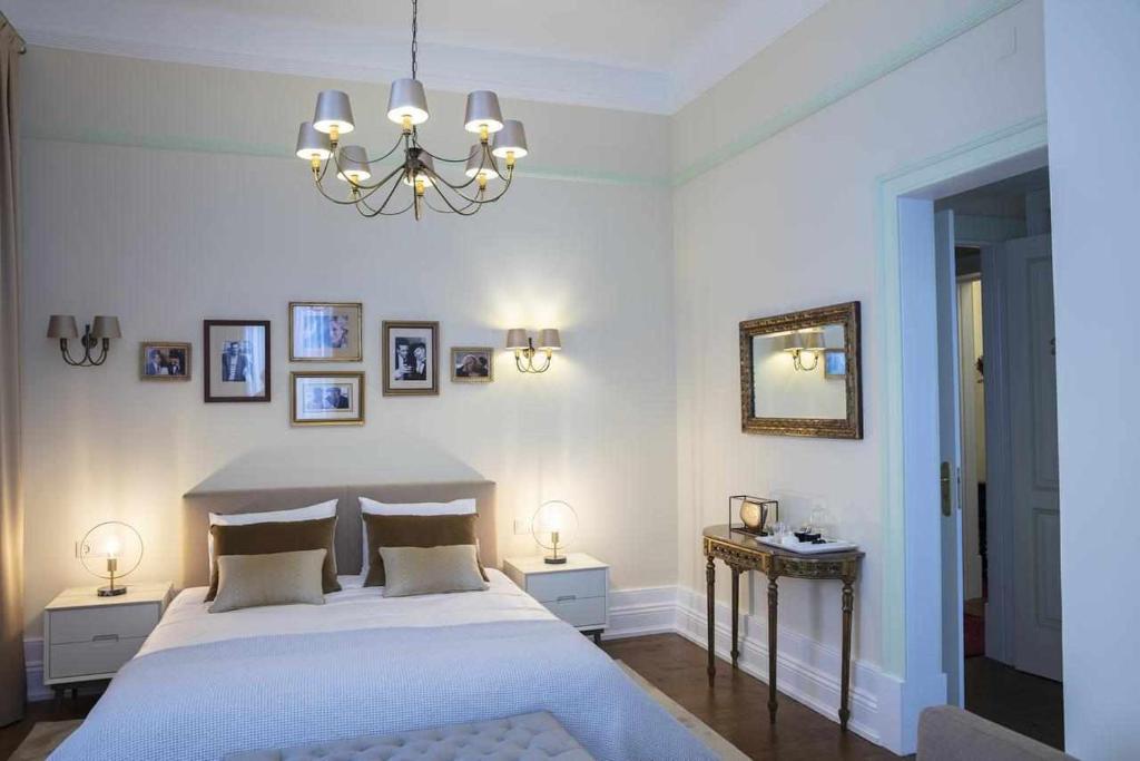 Postel nebo postele na pokoji v ubytování Casa da Granja Boutique