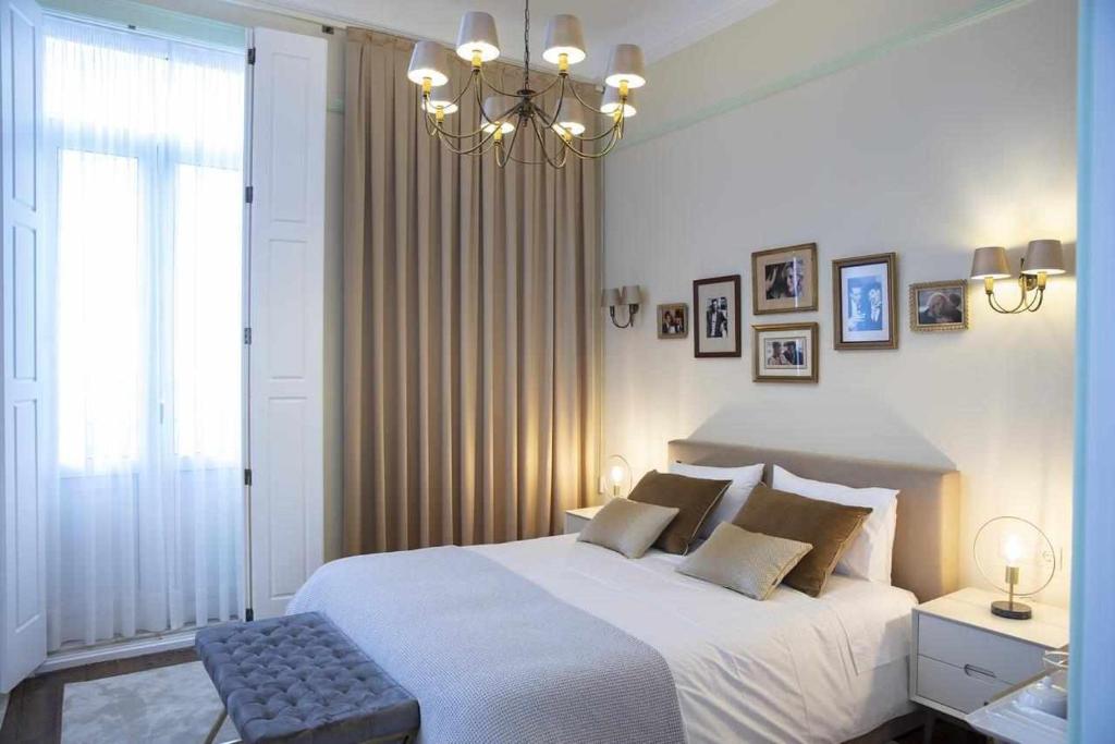 Postel nebo postele na pokoji v ubytování Casa da Granja Boutique