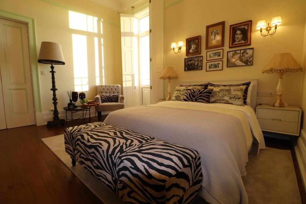 Postel nebo postele na pokoji v ubytování Casa da Granja Boutique