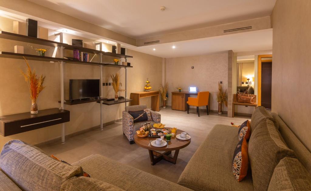 Posezení v ubytování Dellarosa Boutique Hotel and Spa