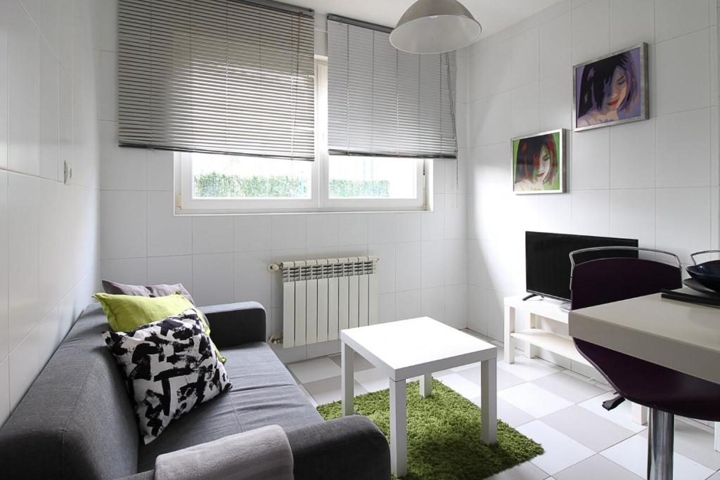 A seating area at Apartamentos El Cuco