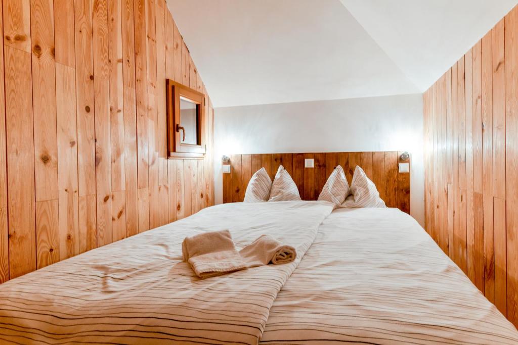 Postel nebo postele na pokoji v ubytování Koča Bistra - Velika planina