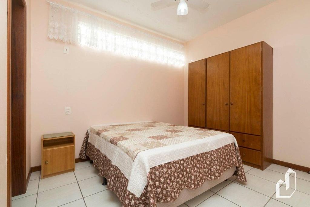  Casa com 03 dormitórios