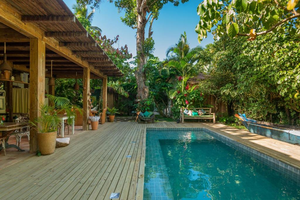 Casa con piscina y terraza de madera en Casa da Glória Trancoso - Pousada Boutique, en Trancoso