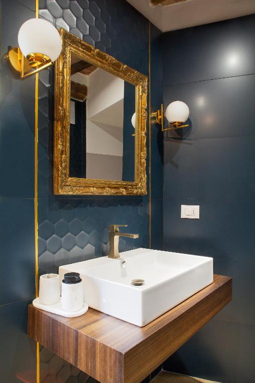 Koupelna v ubytování San Sebastiano Suite & Luxury Apartments