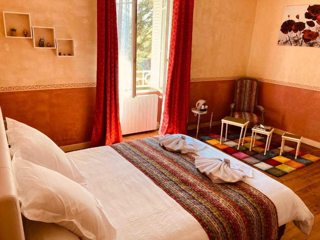 Postel nebo postele na pokoji v ubytování Domaine la jam
