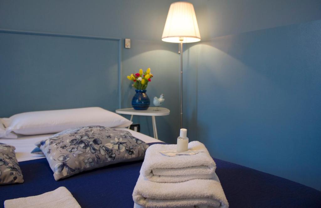 Posteľ alebo postele v izbe v ubytovaní B&B Casanova