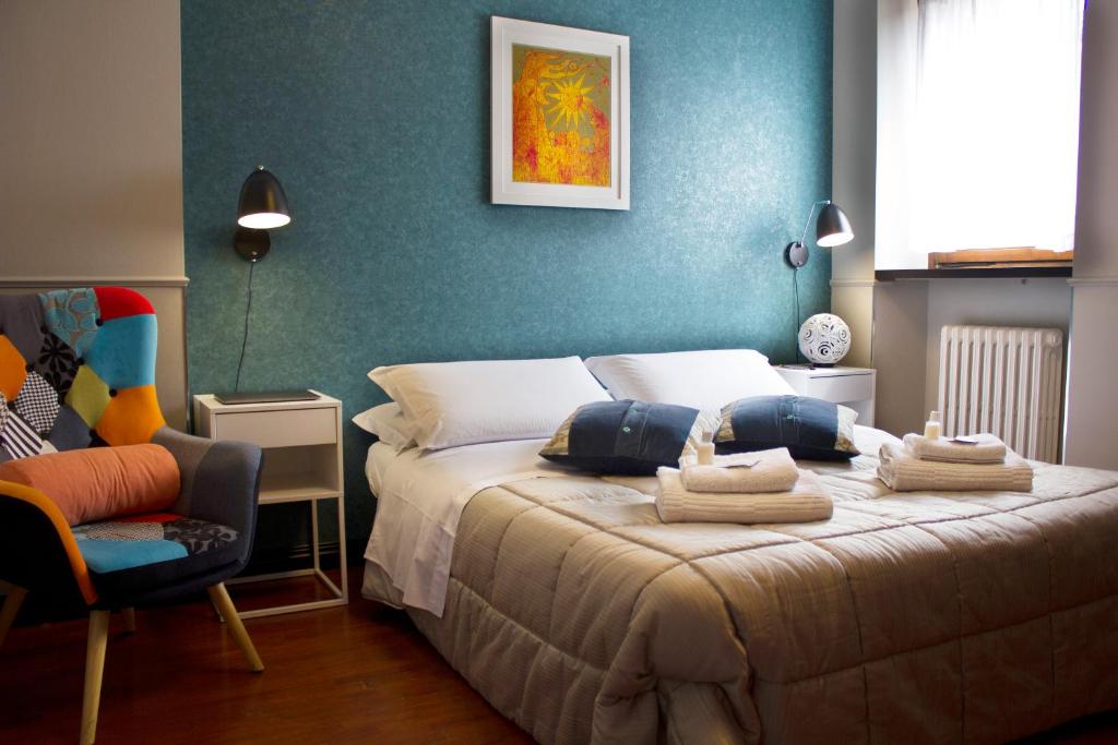 Posteľ alebo postele v izbe v ubytovaní B&B Casanova