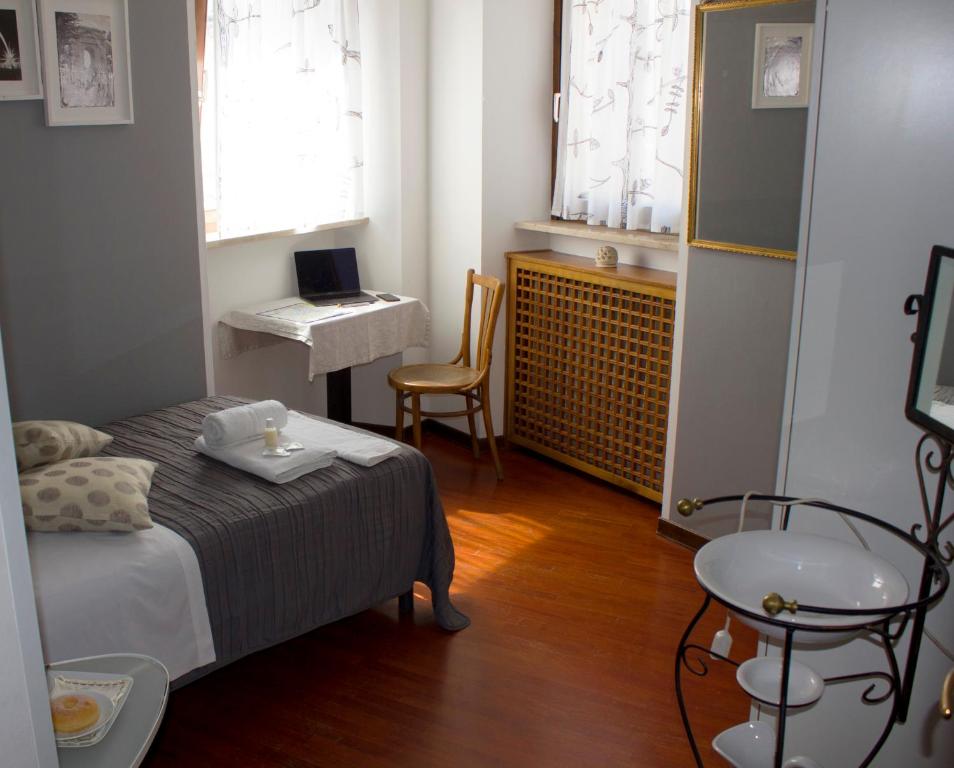 Televízia a/alebo spoločenská miestnosť v ubytovaní B&B Casanova